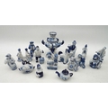 A group of sixteen pieces of Gzhel blue and white porcelain figures and wares, a samovar form lidded... 