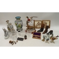A group of ceramics and collectables, including an Ensignette camera, four Nao figurines, largest 26... 