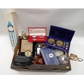 A  group of collectables, including a cased set of jeweller's scales, a die-cast Corgi Queen Elizabe... 