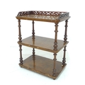 A Victorian walnut veneered whatnot, cut down to three shelves, with pierced gallery, a/f in need of... 