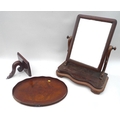 A Victorian mahogany toilet mirror, together with a mahogany wall bracket shelf with scroll support,... 