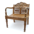 A walnut wide slatted side chair, late 20th century, the ornately carved top rail with anthemion and... 