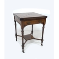 An early 20th century rosewood envelope topped games table, with marquetry inlays, single drawer, tu... 