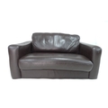 A two seater leatherette sofa in black