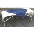 A Mercin Collection folding massage table, with carry handle and blue cover bag, a/f with some disco... 