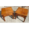 A pair of reproduction bedside tables, mahogany veneered and crossbanded, with single frieze drawer,... 