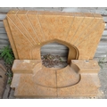 An Art Deco ceramic fireplace surround, with two piece hearth, in mottled glaze. (3)