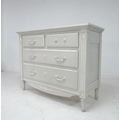 A French Country Corner by Interior's grey chest of drawers, two over three drawers.