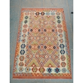 A vegetable dyed wool Choli Kelim rug, 150 by 104cm.