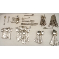 A suite of Edwardian EPNS cutlery, bead pattern, with engraved terminals, comprising together with a... 