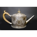 A George III silver teapot, decorated in Neoclassical taste with engraved swags and scrolls, fruitwo... 