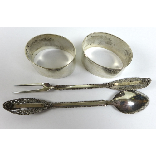 14 - A pair of Elizabeth II silver napkin rings, Sterling silver Ltd. Sheffield, 1978, 3.3toz, together w... 