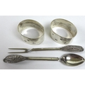 A pair of Elizabeth II silver napkin rings, Sterling silver Ltd. Sheffield, 1978, 3.3toz, together w... 