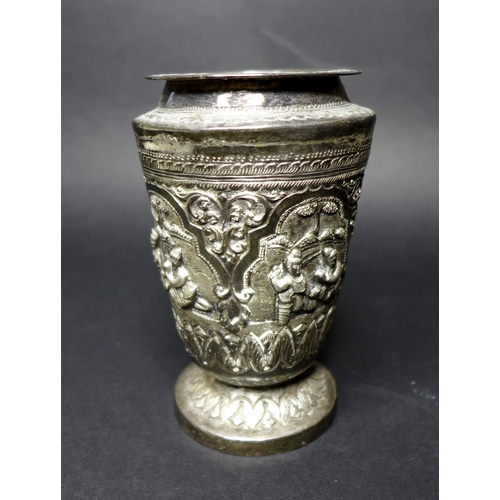 32 - A group of silver and plated items comprising a Burmese silver beaker with chased and repousse panel... 