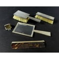 A group of Art Deco silver dressing table items for a gentleman, comprising a Swiss movement silver ... 