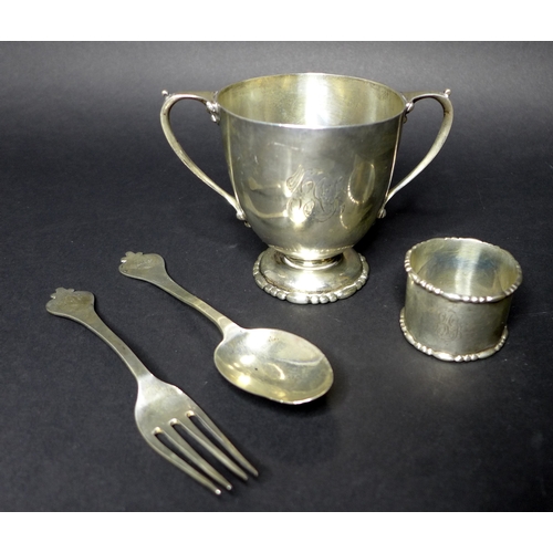 30 - A silver Christening set, Wakely & Wheeler London 1909-10 with twin handled cup, 11.8 wide (includin... 