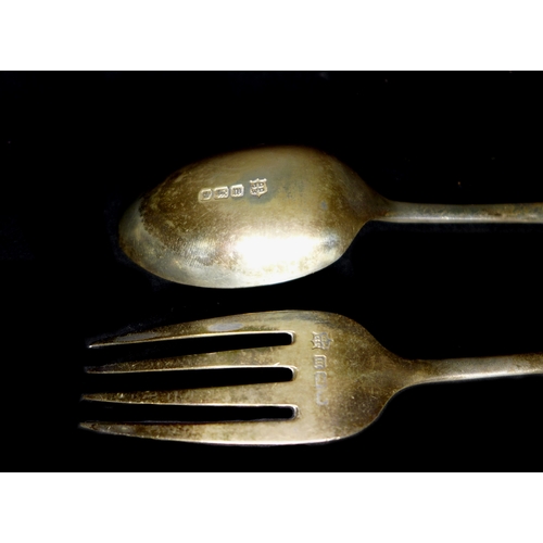 23 - A group of silver items, a cased spoon and fork Christening set, James Deakin & Sons, Sheffield 1904... 