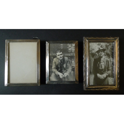 57 - A group of six silver photograph frames, the largest of rectangular form, 23 by 17.3cm, Charles S Gr... 
