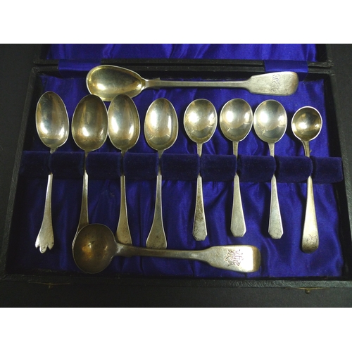 9 - A group of silver items, comprising a Victorian berry spoon, Walker & Hall, Sheffield 1897, a cased ... 