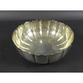 An Irish Elizabeth II silver bowl, of circular lobed form, shaped rim, on low foot rim, Royal Irish ... 