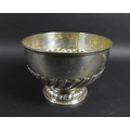 An Edwardian silver rose bowl, decorated with gadrooning interspersed with small circles, presentati... 