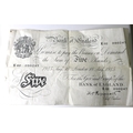 A Bank of England 'Peppiatt' white £5 note, serial K02 090247, dated London 18th August 1945.