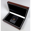 A 2015 London Mint Office Winston Churchill gold quarter sovereign, with certificate presentation bo... 