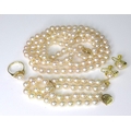 A vintage pink pearls set, all set in 14ct gold, comprising necklace, bracelet, ring and earrings, r... 
