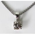 A 9ct white gold and diamond solitaire necklace, the brilliant cut stone of approximately 0.4ct, on ... 