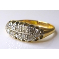 An 18ct gold twelve stone diamond ring, approximately 0.9ct overall, size P, 4g.