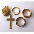 Three 9ct gold rings, comprising a Clogau gold ring, size L/M, a decorated band, size M/N, and a pla... 