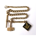 A 9ct gold early 20th century Masonic Albert chain, with square form Masonic fob with inscription ve... 
