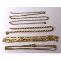 A group of 9ct gold chains, comprising three necklaces and a bracelet, one necklace measuring 45cm a... 