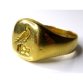 A Victorian 18ct gold signet ring, with engraved bird in hand decoration, maker D&F, Birmingham 1896... 