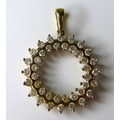 A 9ct gold and diamond circular pendant, with 40 round brilliant cut diamonds totalling approximatel... 