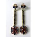 A pair of fancy sapphire, ruby and diamond drop earrings, 6.1cm long, 9.1g, with card certificate of... 