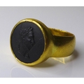 A gentleman's 22ct gold signet ring, set with a Wedgwood black basalt cameo, AC Co, London 1945, siz... 