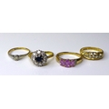 A group of three 18ct gold dress rings, comprising a sapphire and diamond cluster ring, size M, a pl... 