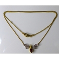 An 18ct gold, tourmaline and diamond bee pendant necklace, the thorax set with a pear shaped tourmal... 
