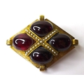 A Victorian garnet and seed pearl brooch, likely 15ct gold, the four cabouchon garnets each of appro... 