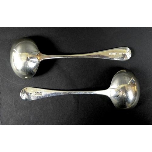 17 - A pair of Victorian silver sauce ladles, Old English pattern, armorial engraved terminals, Holland, ... 