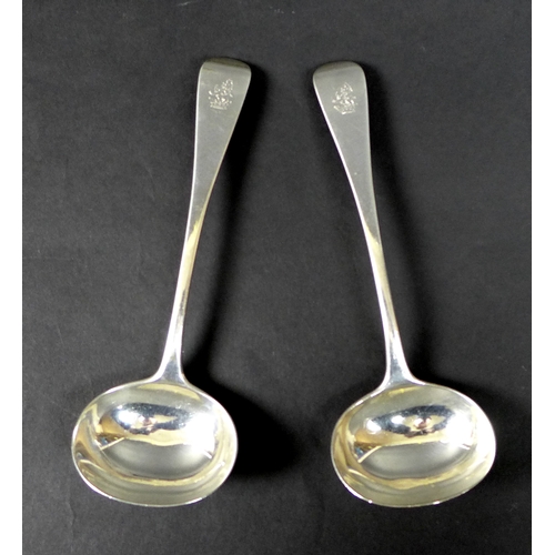 17 - A pair of Victorian silver sauce ladles, Old English pattern, armorial engraved terminals, Holland, ... 