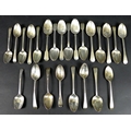 A group of Georgian and later desert spoons, mostly Hanoverian and Old English pattern, some with te... 