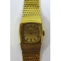 An 18ct gold Girard Perregaux lady's wristwatch, circa 1978, with textured link 18ct gold strap, the... 