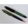 A vintage Pelikan 140 green and black fountain pen, with 14ct gold nib, 12.5cm, together with matchi... 