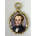 A Victorian oval portrait miniature, half length, depicting a Victorian gentleman with blue cravat, ... 