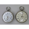 Two Victorian silver cased key wound pocket watches, both with white enamel dials, black Roman numer... 