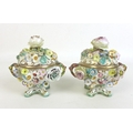 A pair of 19th century porcelain encrusted polychrome twin handled bowls and covers, circa 1835, pro... 