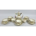 A 19th century Herend style reticulated porcelain Oriental inspired tea set, with Chinese style flor... 