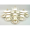 A Royal Doulton part dinner and coffee service, decorated in the Harlow pattern, H5034, eight person... 